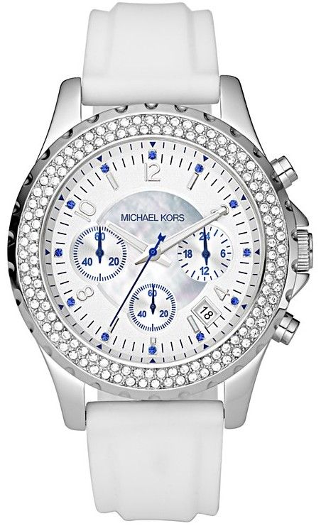 vibrant blue accents add drama to this icy watch by michael kors